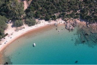 Punta Coda Cavallo by boat 